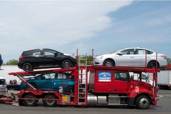 Auto transport truck carrying vehicles on an interstate highway