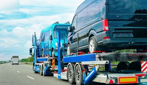 Vehicle relocation truck prepared for a regional shipment