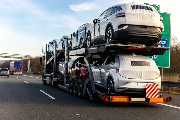 Door to Door New Jersey Car Shipping Services 2 New Jersey open trailer